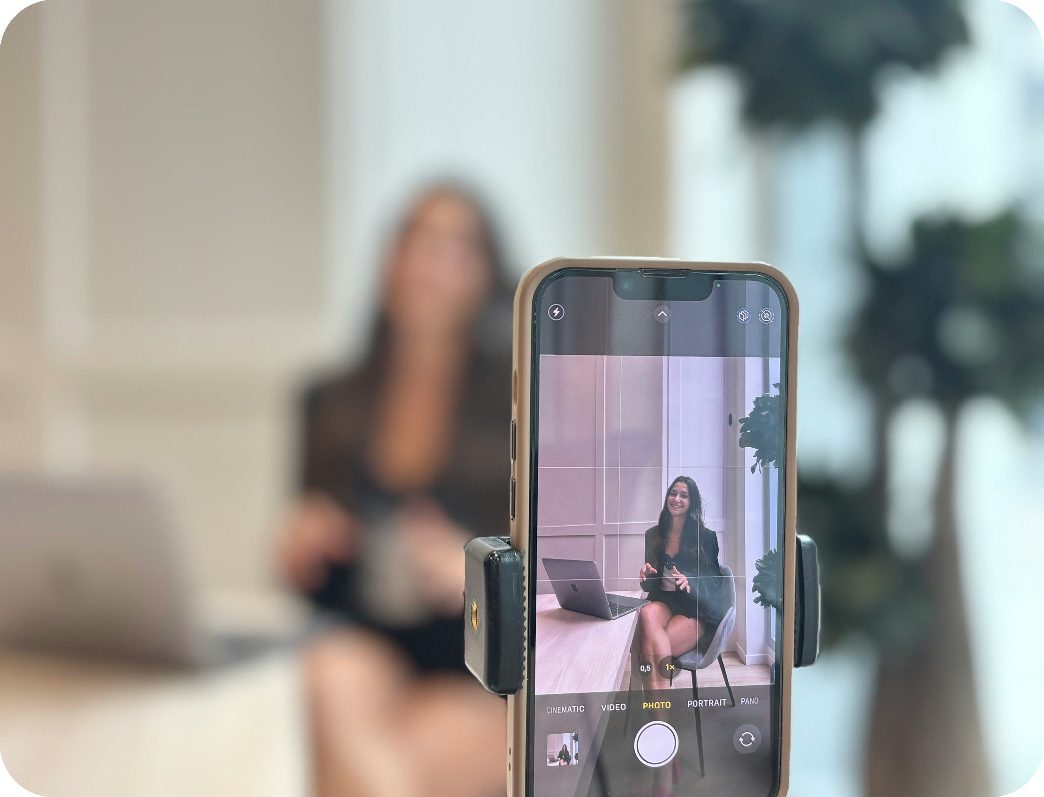 Creator recording a video with her phone